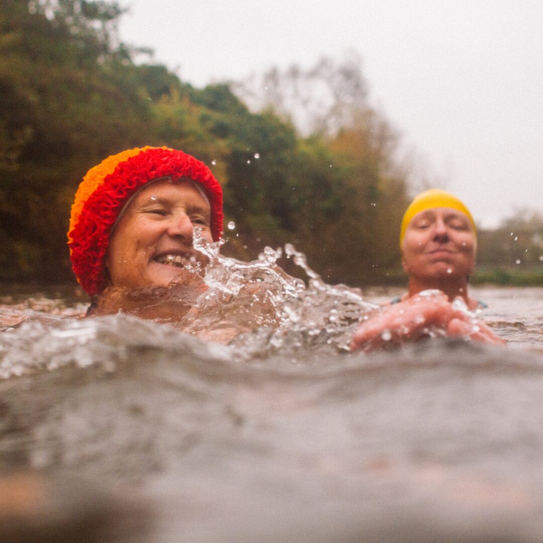 Two simmers in open water